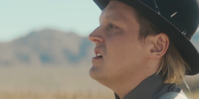 Watch Arcade Fire’s New “Everything Now” Video